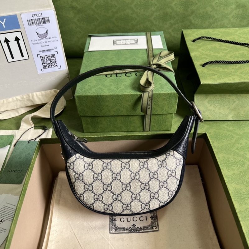 G*u*i top handle bags